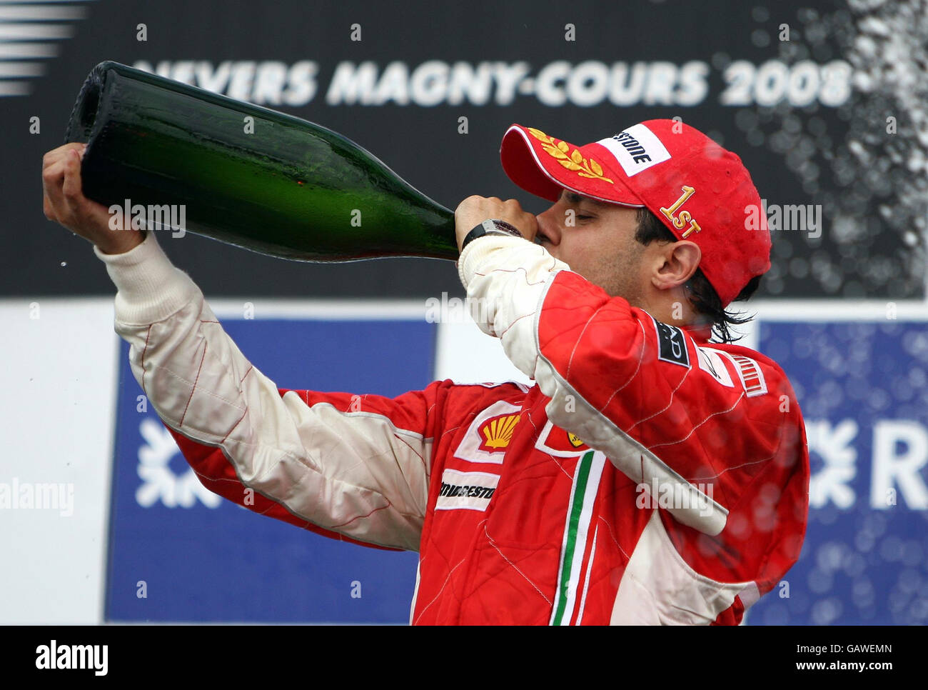 Formula One Motor Racing - French Grand Prix - Race - Magny Cours. Ferrari's Felipe Massa celebrates his victory during the Grand Prix at Magny-Cours, Nevers, France. Stock Photo
