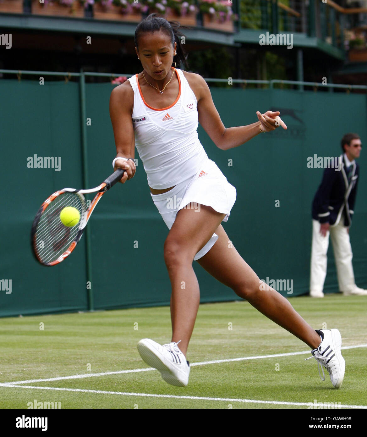 Great Britain's Anne Keothavong during her doubles match with Melanie South during The Wimbledon Championships at The All England Lawn Tennis Club, Wimbledon, London. Stock Photo