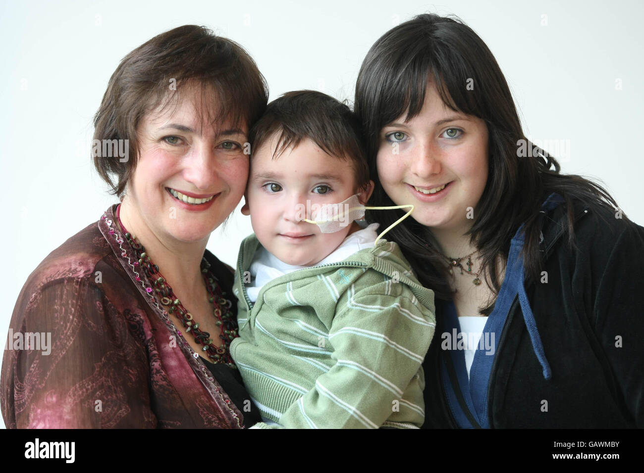 Anette Kinne with her son Alexander, 3, and daughter Genevive, 15, at the launch of RehabCare's investigative report into the social support needs of families who experience rare disorders on the island of Ireland, at the Science Gallery, Naughton Institute, Trinity College, Dublin, today. Stock Photo