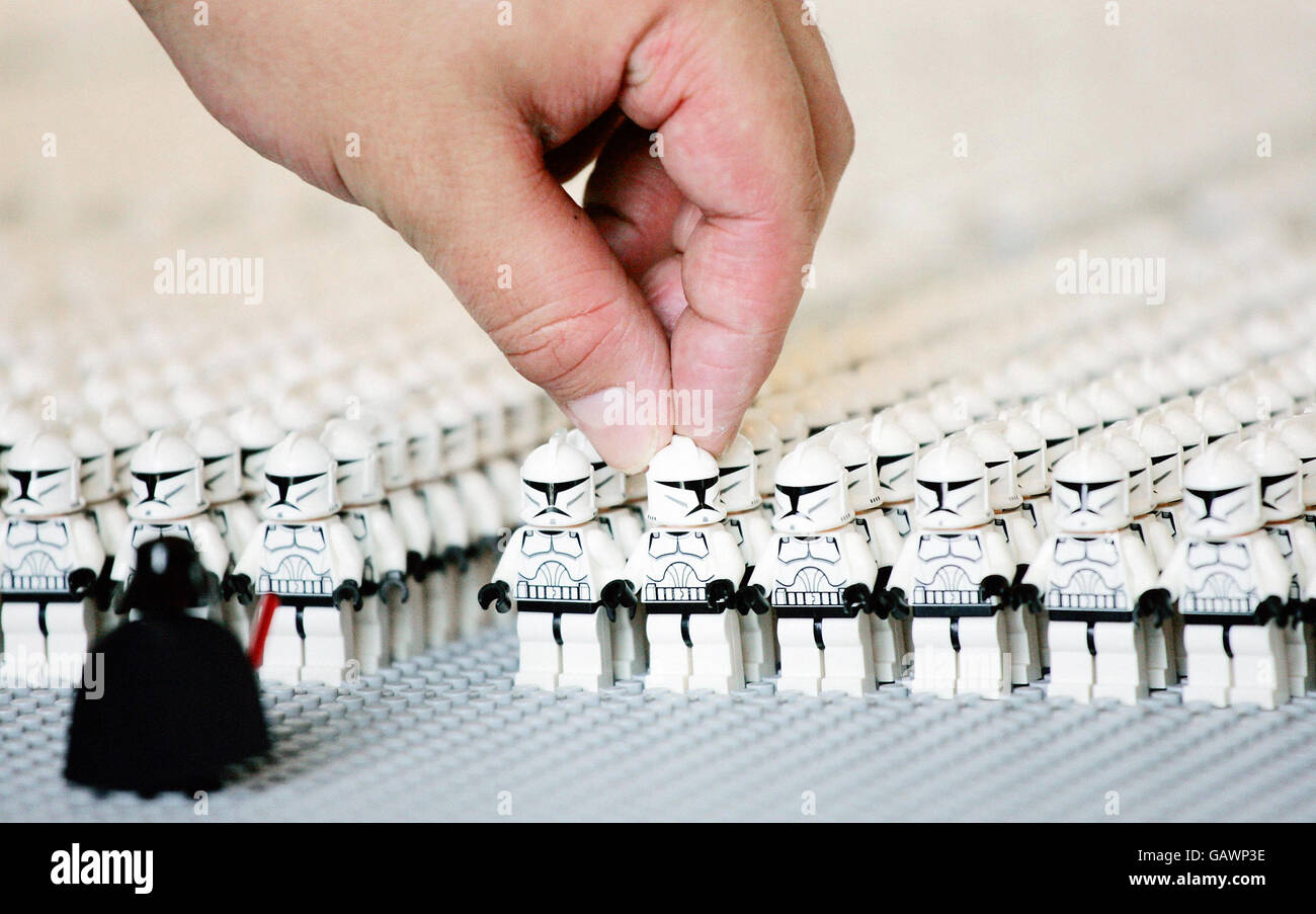 A LEGO UK employee helps assemble the Guinness World Record