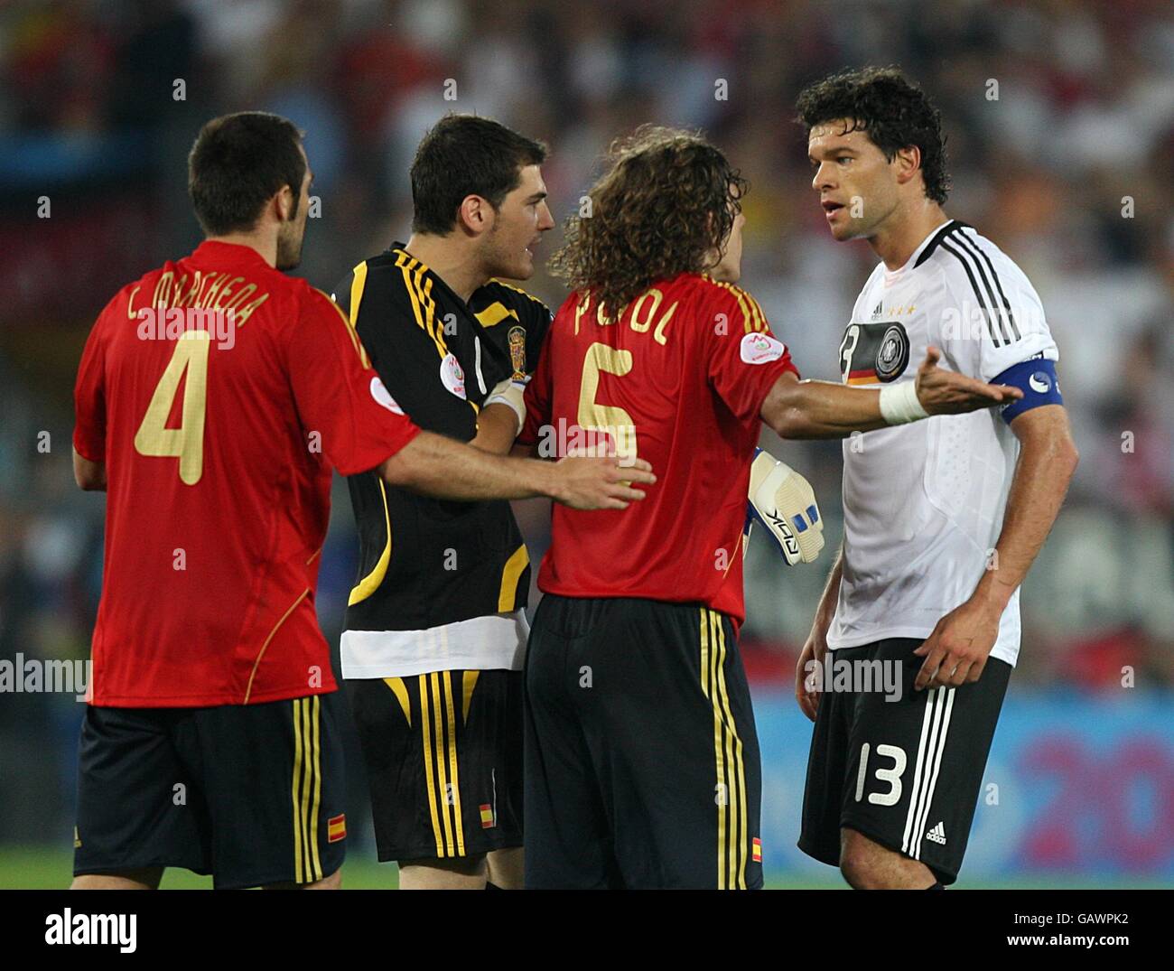 Soccer - UEFA European Championship 2008 - Final - Germany v Spain - Ernst Happel Stadium. Germany's Michael Ballack (r) confronts Spain's Carles Puyol Stock Photo