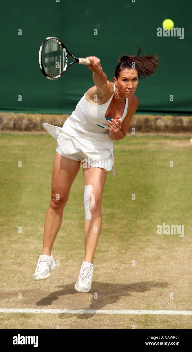 Serbia's Jelena Jankovic in action against Thailand's Tamarine Tanasugarn during the Wimbledon Championships 2008 at the All England Tennis Club in Wimbledon. Stock Photo
