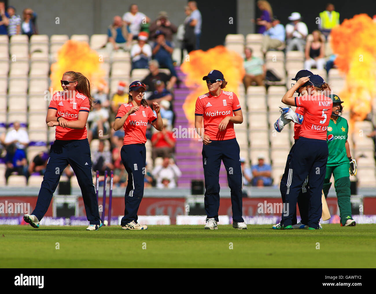The Ageas Bowl, Southampton, UK. 05th July, 2016. Women's NatWest International T20. England versus Pakistan. England's youngest player, 17 year old Sophie Ecclestone (left) celebrates after bowling out Pakistan's San Mir © Action Plus Sports/Alamy Live News Stock Photo