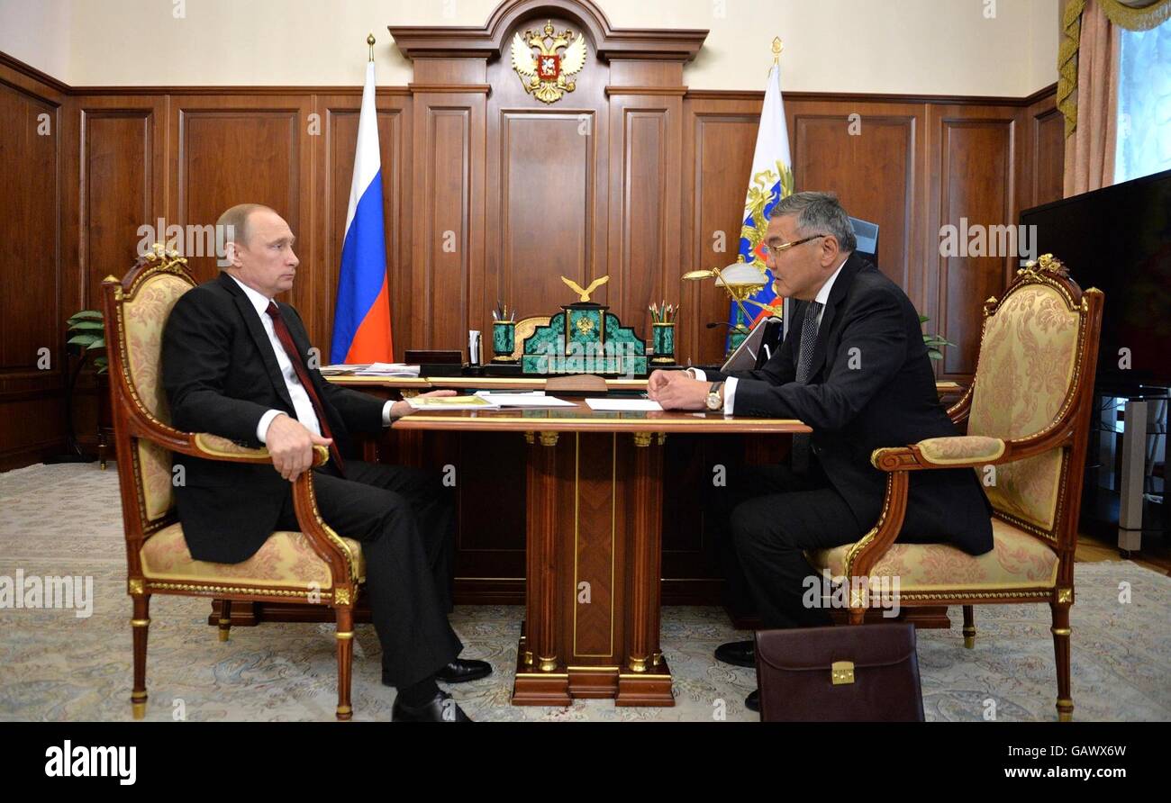 Russian President Vladimir Putin during a meeting with the Head of the Republic of Kalmykia Alexei Orlov at the Kremlin July 5, 2016 in Moscow, Russia. Stock Photo