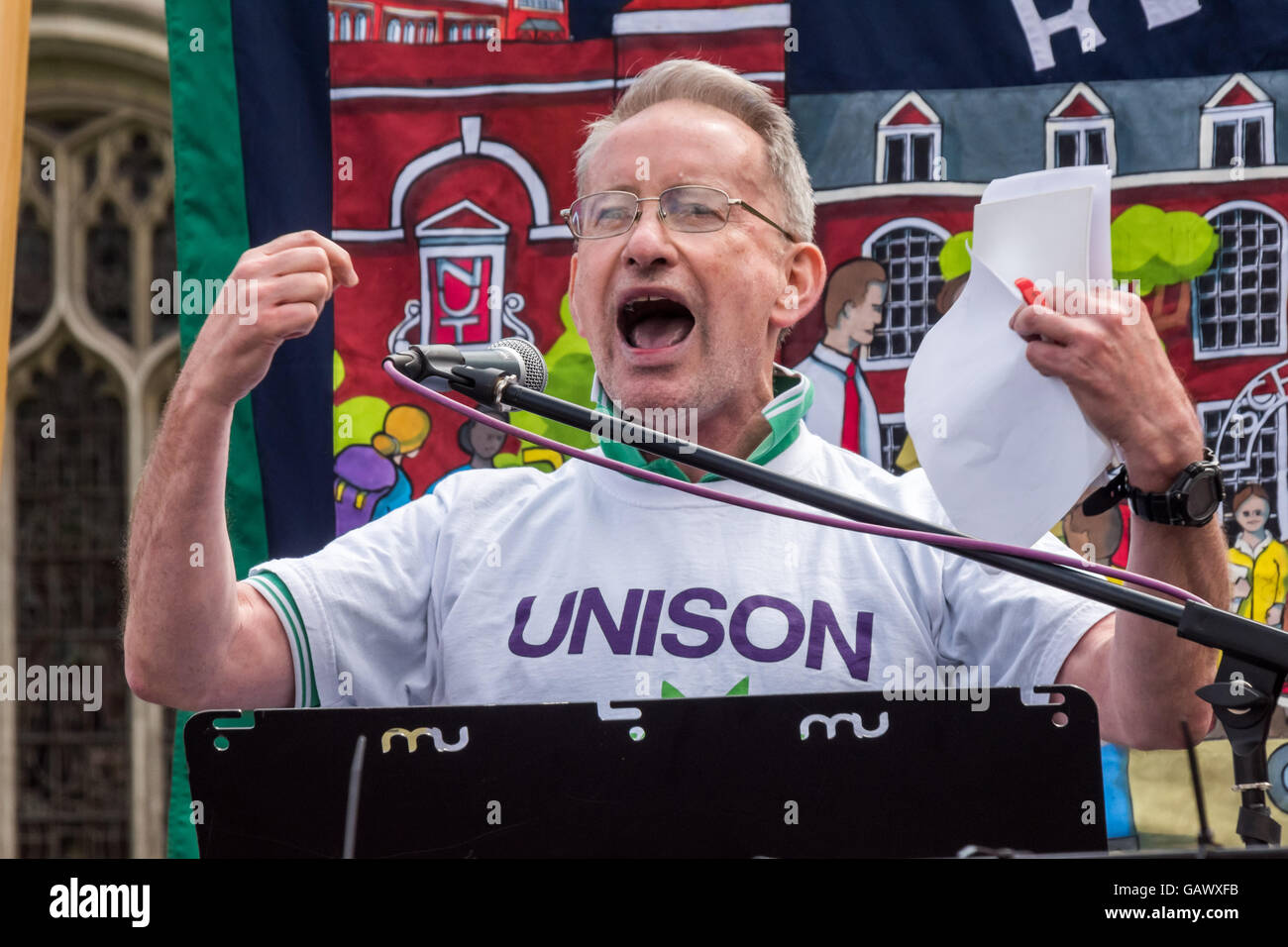 London, UK. 5th July, 2016. John McLoughlin of Tower Hamlets Unison, the union which represents teaching assistants and other ancillary staff in schools, speaks at the NUT rally in Parliament Square after their march through London on the day of their strike against cuts in government funding and the increasing deregulation of teachers' pay and conditions through the increasing pressure on schools to become academies. Credit:  Peter Marshall/Alamy Live News Stock Photo
