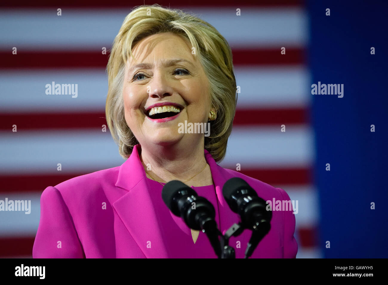 Charlotte, NC, USA. 5th July, 2016. A portrait of US Democratic presumptive presidential nominee, Hillary Clinton, smiling as she delivers a speech at a campaign rally at the Charlotte Convention Center. Credit:  Evan El-Amin/Alamy Live News Stock Photo