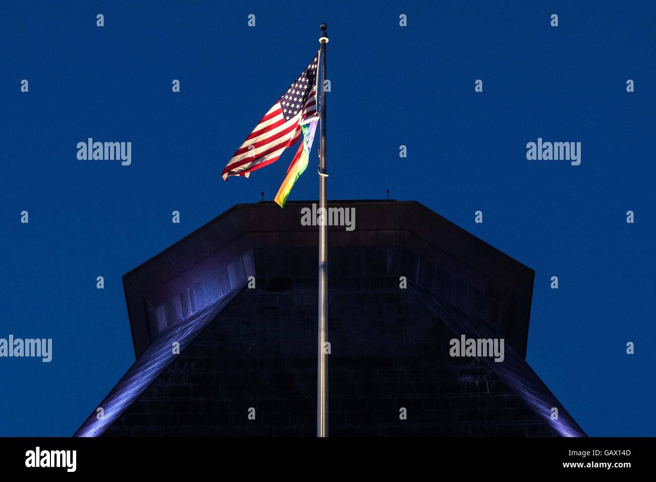 Ottawa, Ontario, Canada. 4th July, 2016. The Pride flag hangs just below the Stars and Stripe over the the Embassy of the United States of America in Ottawa, Ont., on July 4, 2016. © Lars Hagberg/ZUMA Wire/Alamy Live News Stock Photo