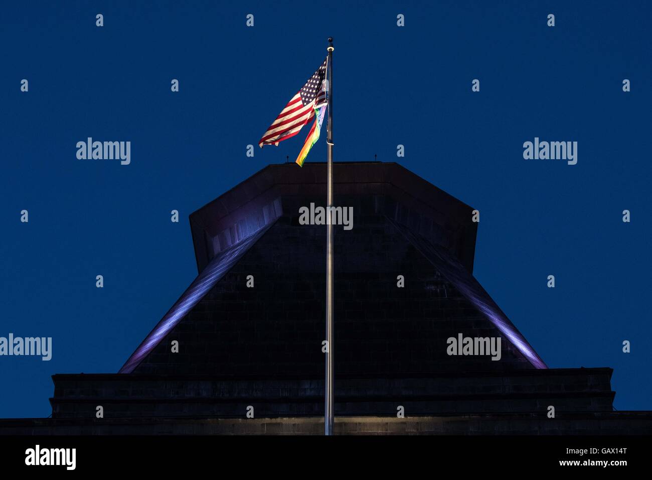 Ottawa, Ontario, Canada. 4th July, 2016. The Pride flag hangs just below the Stars and Stripe over the the Embassy of the United States of America in Ottawa, Ont., on July 4, 2016. © Lars Hagberg/ZUMA Wire/Alamy Live News Stock Photo