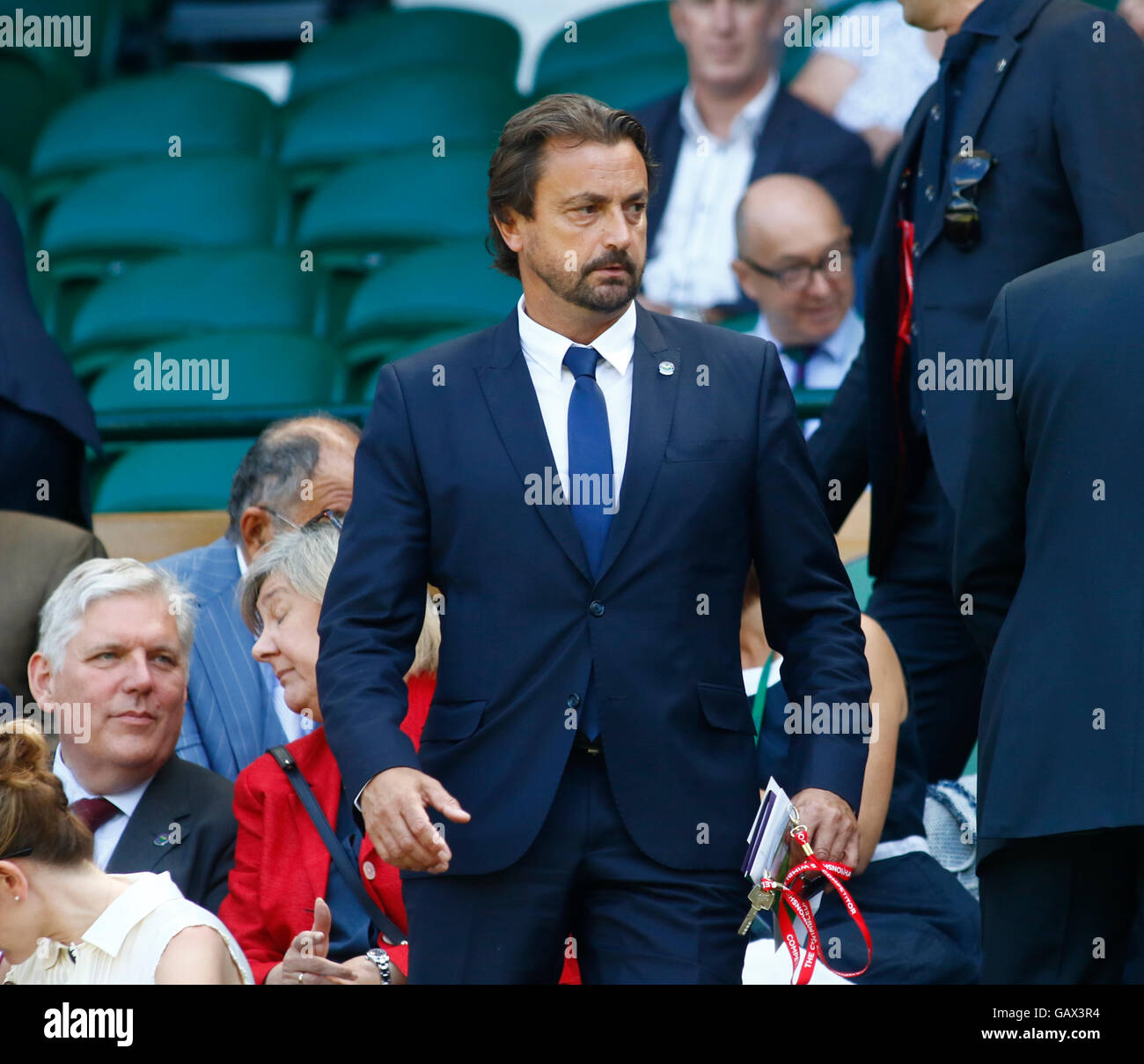 London, UK. 6th July, 2016. All England Lawn Tennis and Croquet Club, London, England. The Wimbledon Tennis Championships Day 10.  French tennis legend Henri Leconte in the Royal Box on Centre Court before today's quarter final between number 3 seed, Roger Federer (SUI) and number 9 seed, Marin Cilic (CRO). © Action Plus Sports Images/Alamy Live News Credit:  Action Plus Sports Images/Alamy Live News Stock Photo