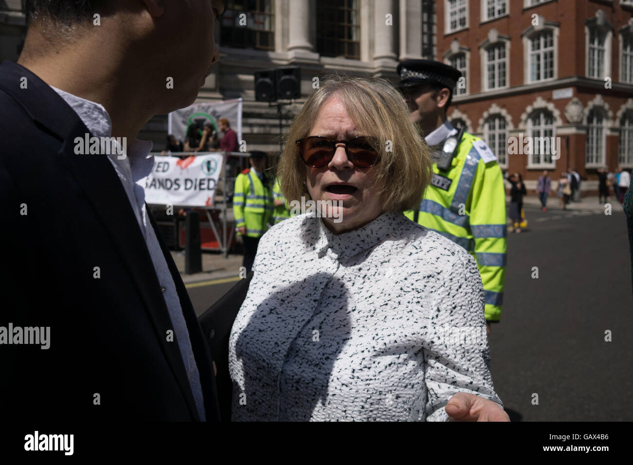London, UK. 6th July 2016. Lindsey German of the Stop the War Coalition demand Tony Blair to be put on trail at the Hague for war crimes outside QEII Centre during Chilcot war report on Britains role in the Iraq way is published today,   London, UK. Credit:  See Li/Alamy Live News Stock Photo