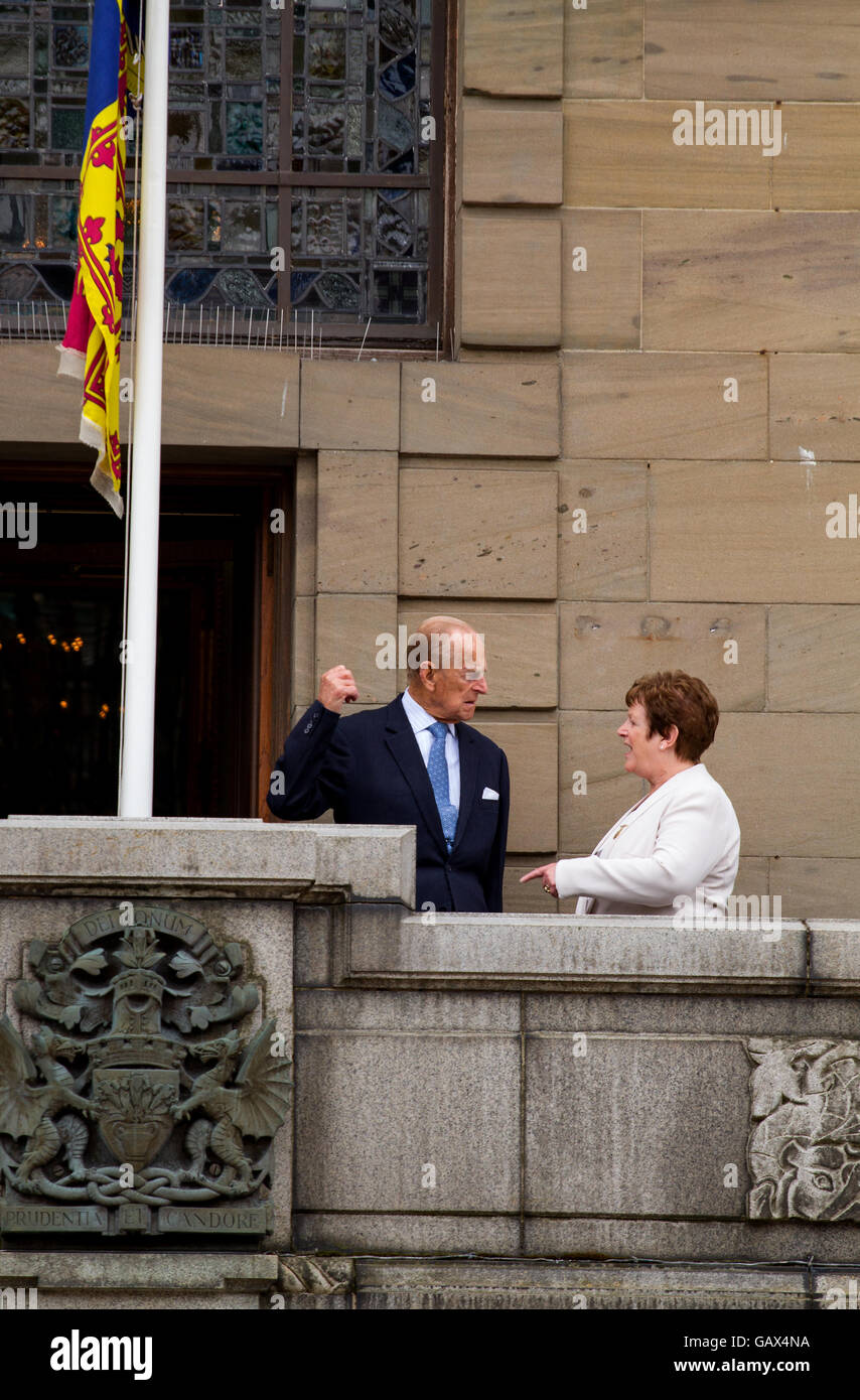 Dundee, Tayside, Scotland, UK. July 6th 2016. Her Majesty The Queen and His Royal Highness Prince Philip today during their Royal visit to Dundee. On the Balcony of The Chambers of Commerce with Prince Philip is the Right Lady Lord Provost [right]. Credit: Dundee Photographics / Alamy Live News Stock Photo