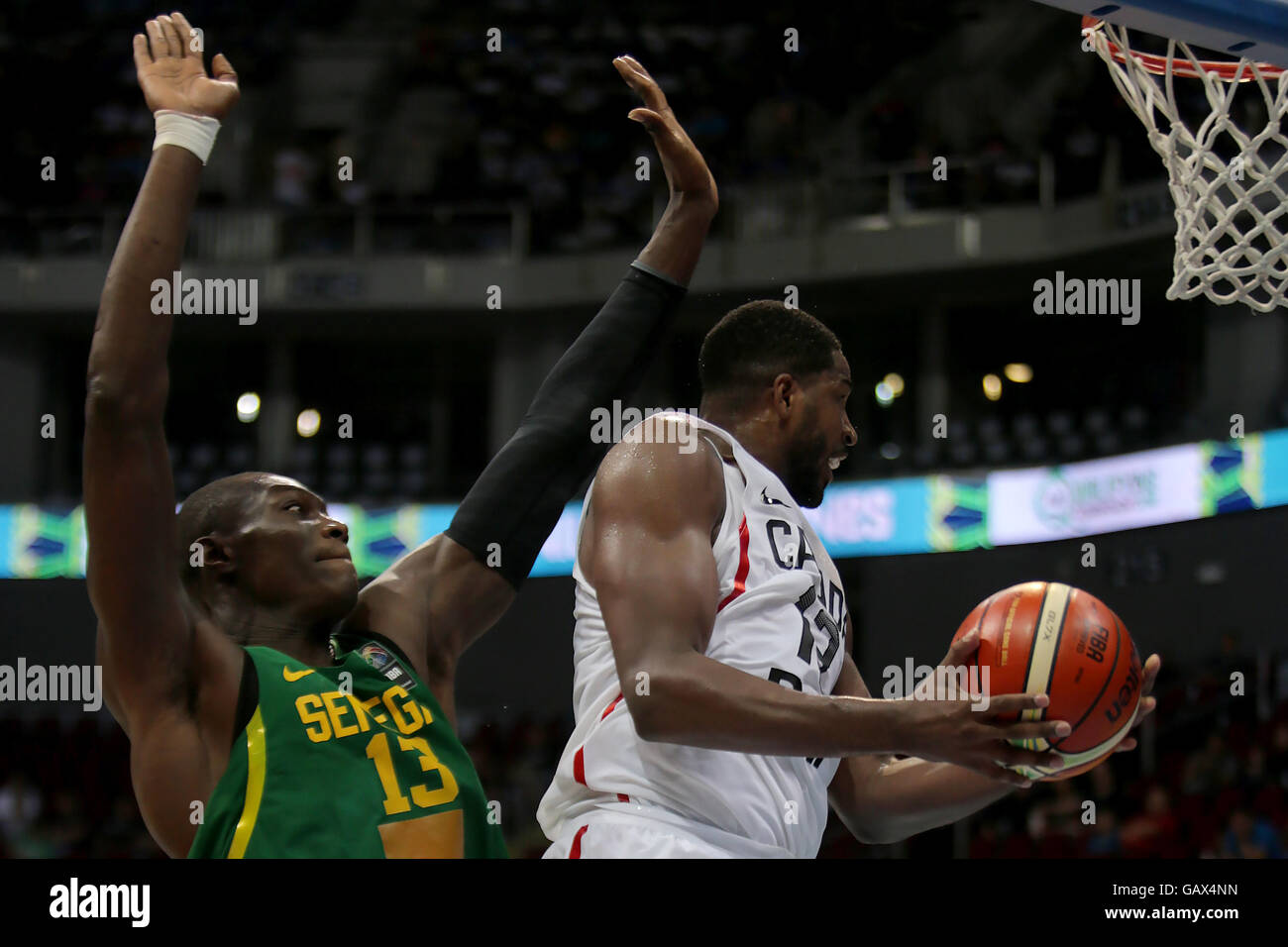 Pasay City, Philippines. 6th July, 2016. Tristan Thompson (R) of Canada competes against Hamady Ndiaye of Senegal during their FIBA Olympic Qualifying Tournament in Pasay City, the Philippines, July 6, 2016. Canada won 58-55. © Rouelle Umali/Xinhua/Alamy Live News Stock Photo