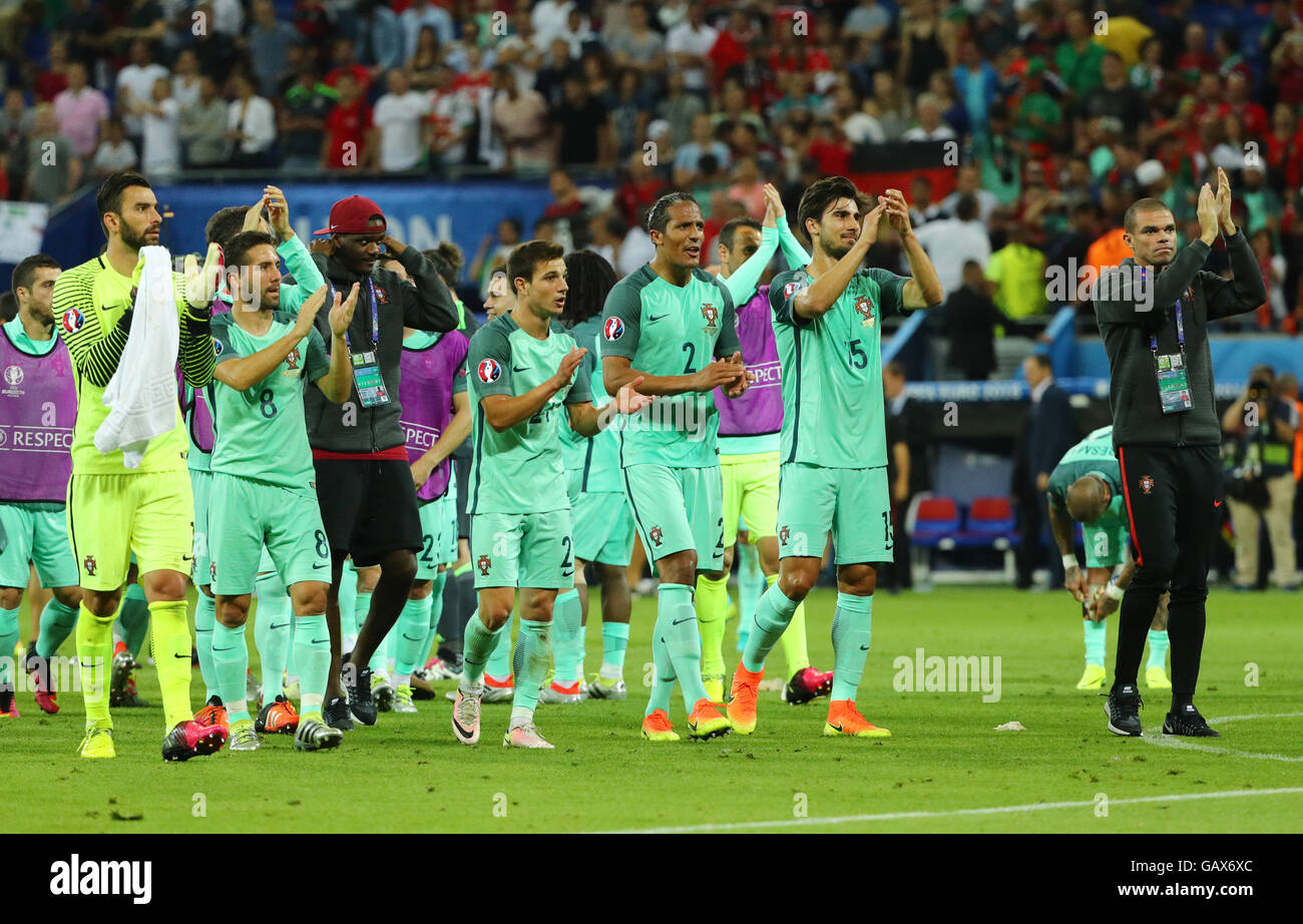 Lyon, France. 06th July, 2016. Portugal players celebrate after the UEFA EURO 2016 semi final soccer match between Portugal and Wales at the Stade de Lyon in Lyon, France, 06 July 2016. Portugal won the match with a 2:0 score. From left to right: goalkeeper Rui Patricio, Joao Moutinho, Cedric Soares, Bruno Alves, Andre Gomes and Pepe. Photo: Christian Charisius/dpa/Alamy Live News Stock Photo