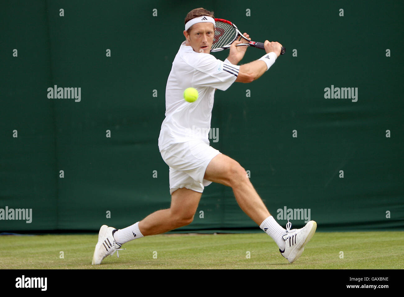 Jonas Bjorkman in action against Arnaud Clement at Wimbledon Stock ...
