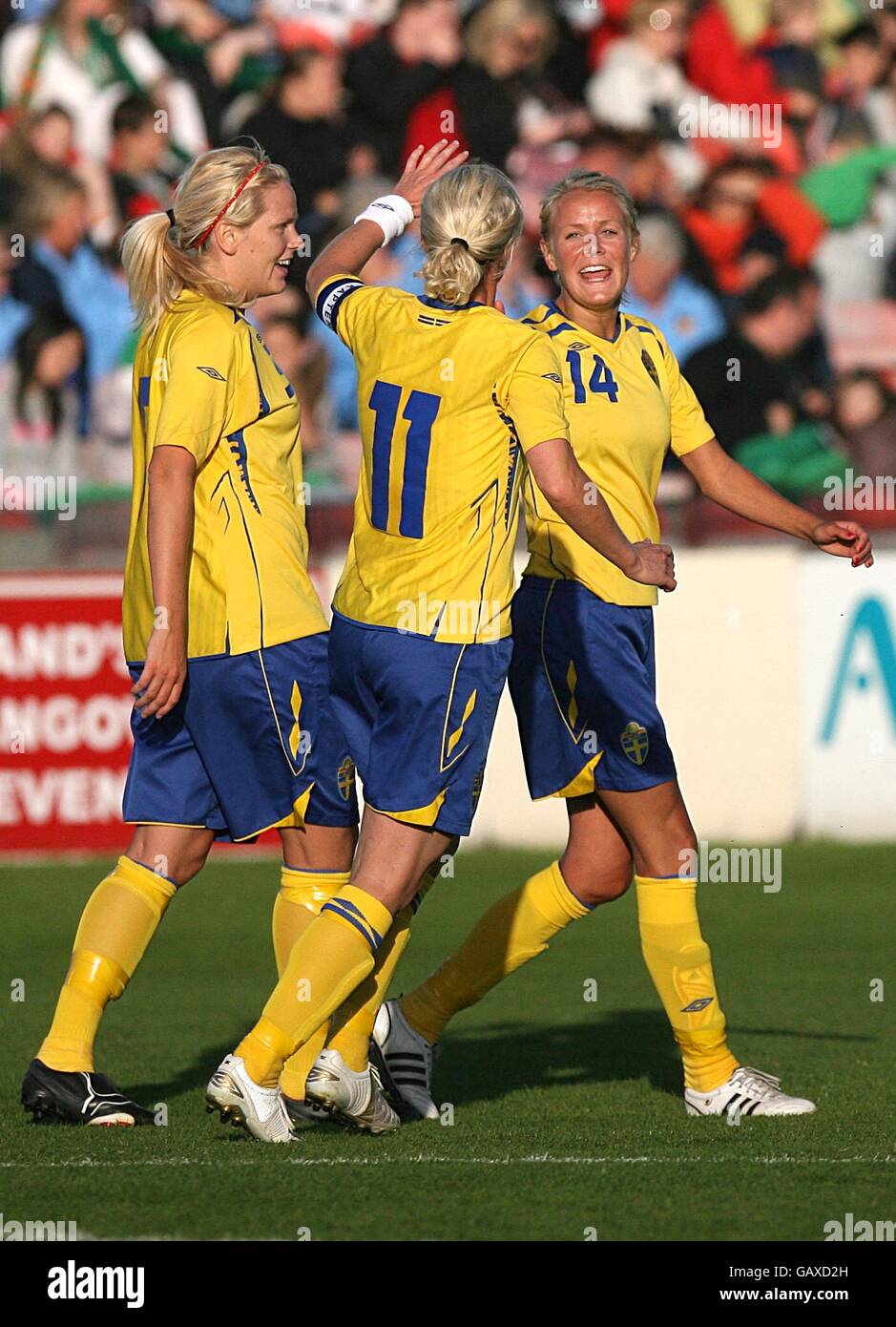 Swedens josephine ogvist celebrates her goal with victoria svennson