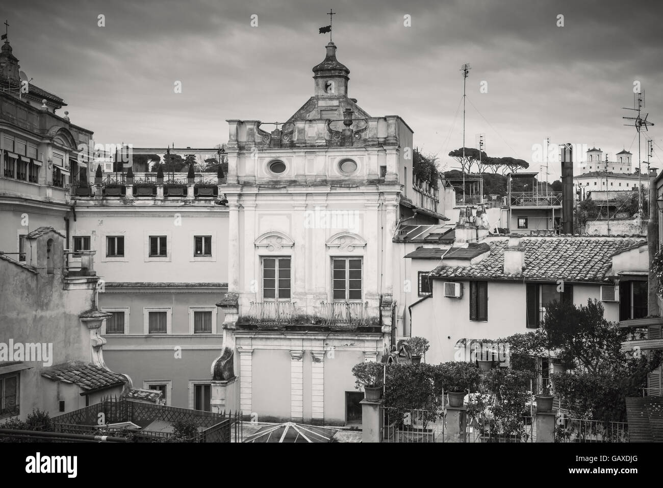 Skyline of old Rome, Italy. Via del Corso, retro stylized black and white street view photo Stock Photo
