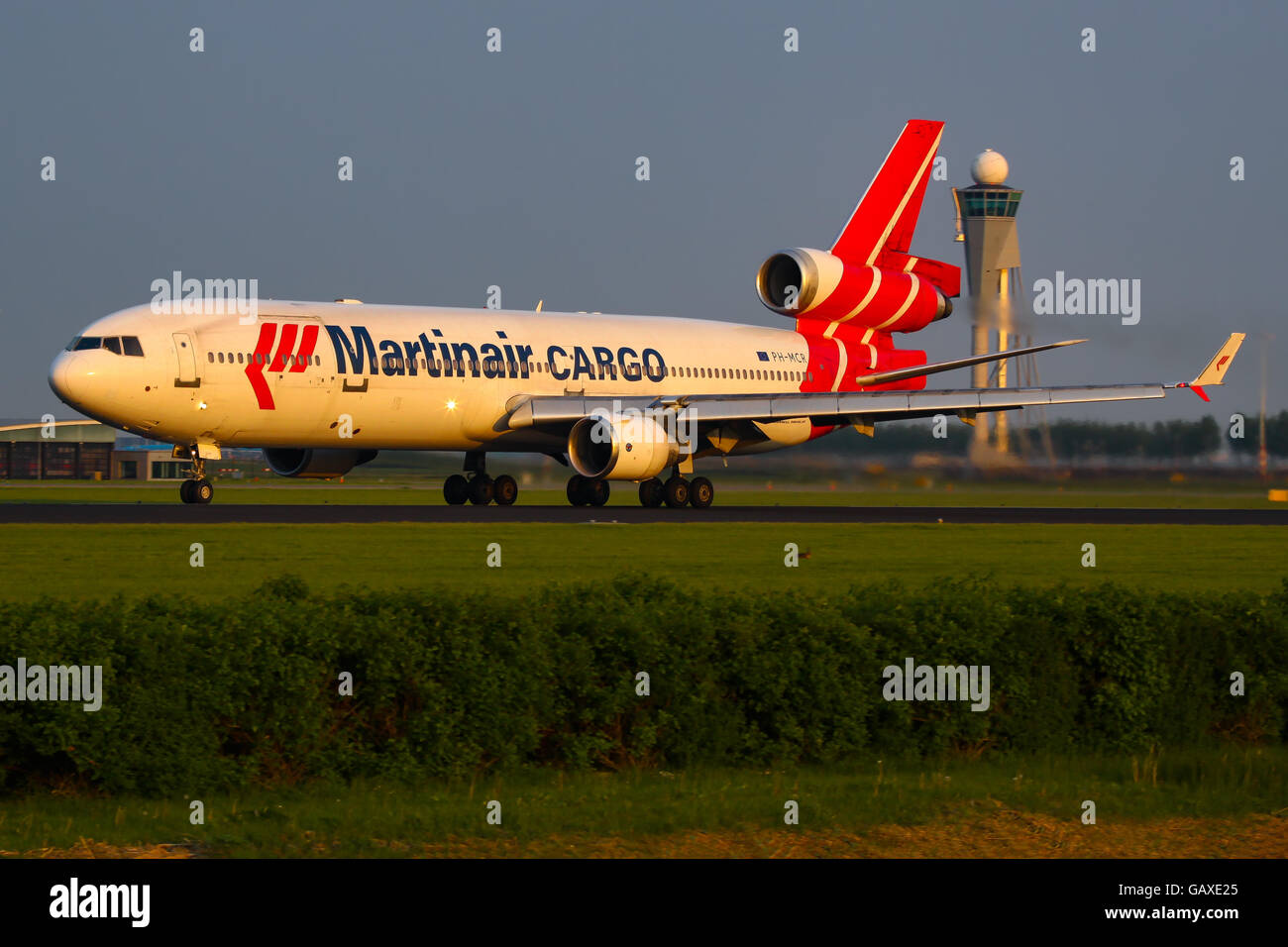 Martinair Cargo McDonnell Douglas MD-11 Freighter departing Amsterdam in the evening light. Stock Photo