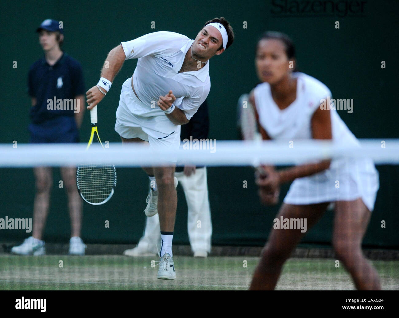 Great Britain's Ross Hutchins and Anne Keothavong in their mixed doubles match during the Wimbledon Championships 2008 at the All England Tennis Club in Wimbledon. Stock Photo
