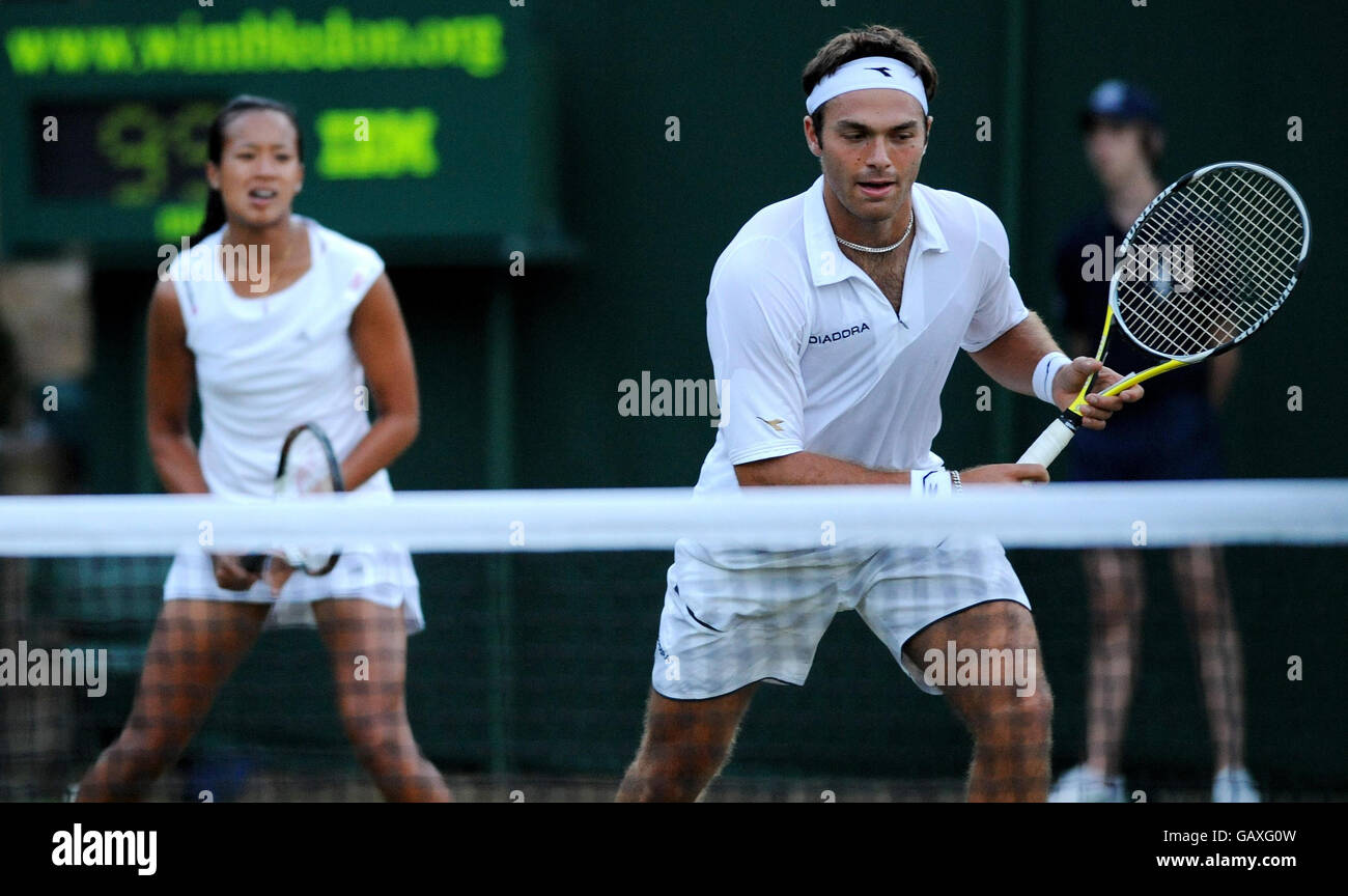Great Britain's Ross Hutchins and Anne Keothavong in their mixed doubles match during the Wimbledon Championships 2008 at the All England Tennis Club in Wimbledon. Stock Photo