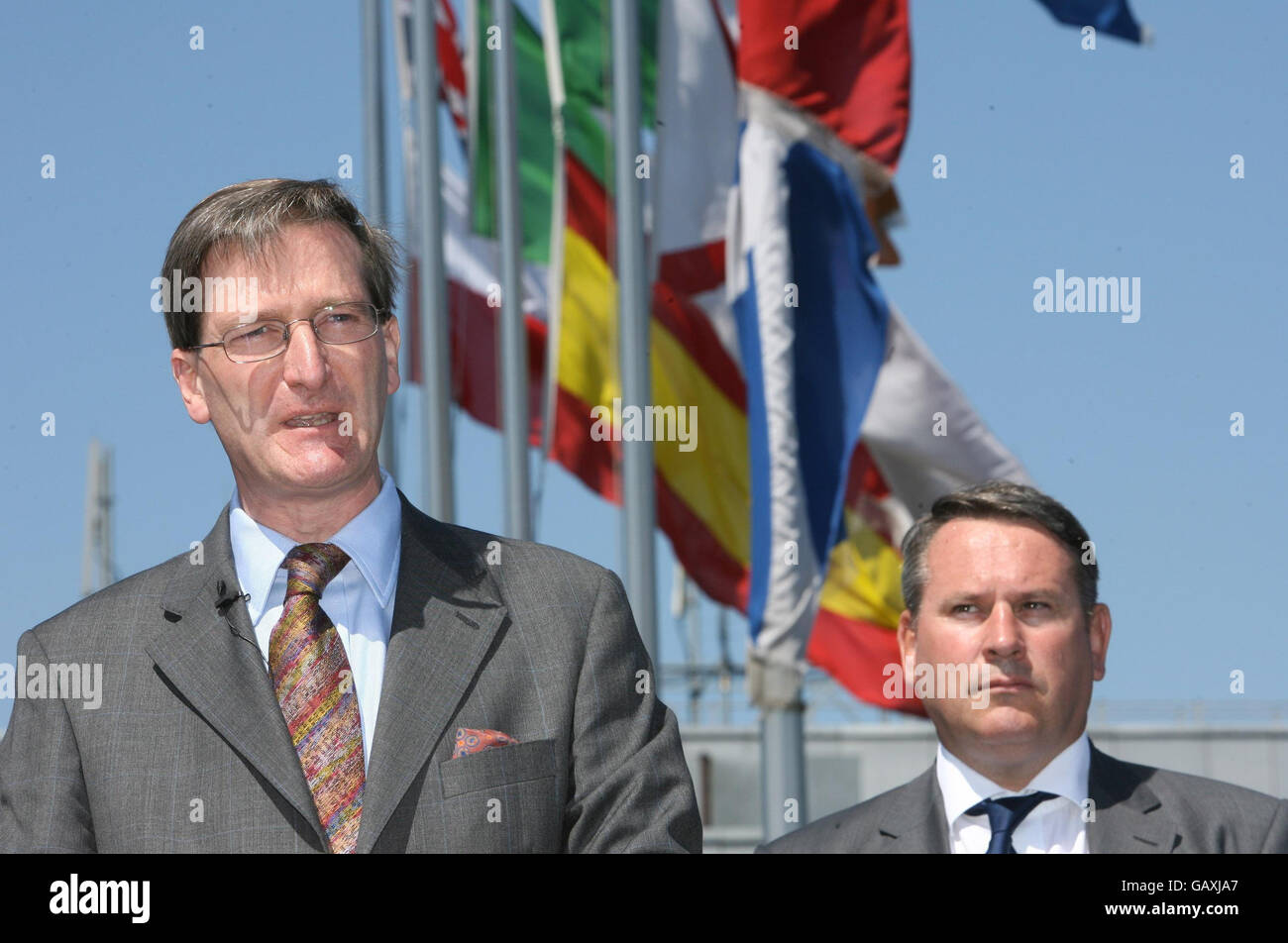 Conservative Party Shadow Home secretary Dominic Grieve speaks to the press during the launch of Lord Stevens' report 'Border Protection Service for the UK: Policy Proposals' at London City Airport in east London, as Colonel Richard Kemp (right) looks on. Stock Photo