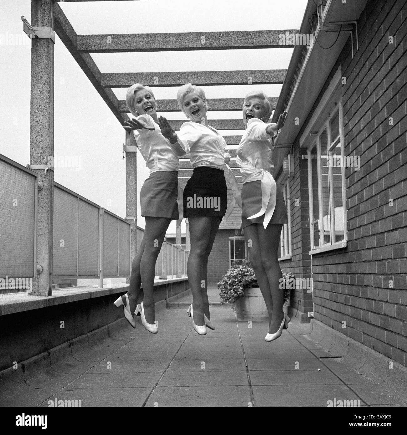 Ringing a new note from Liverpool are 'The Satin Bells', twins Carola (left) and Sue (centre), with their sister Jeanie Bell (right) Stock Photo