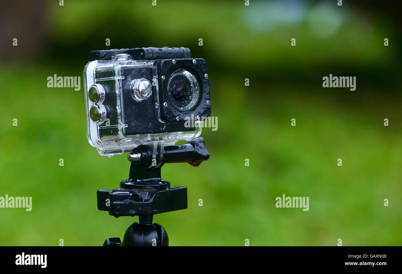Action camera in a protective cover in the rain. close up shot Stock Photo  - Alamy