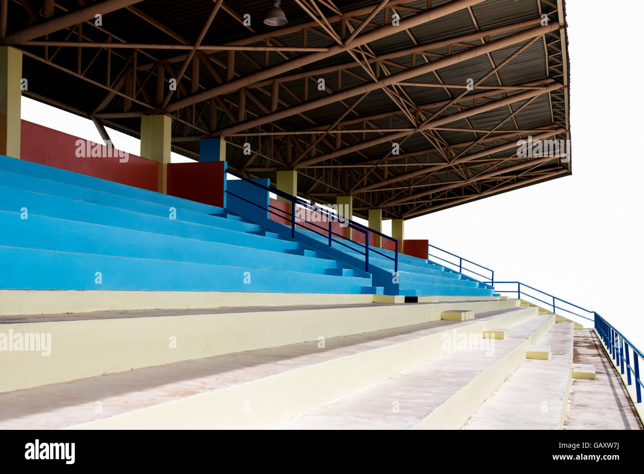 Rows of multilevel empty grandstand seats  on white background Stock Photo