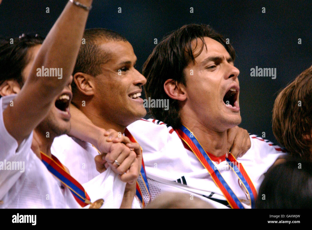 AC Milan's Rivaldo and Filippo Inzaghi celebrate their teams win in the UEFA Champions League Final against Juventus Stock Photo