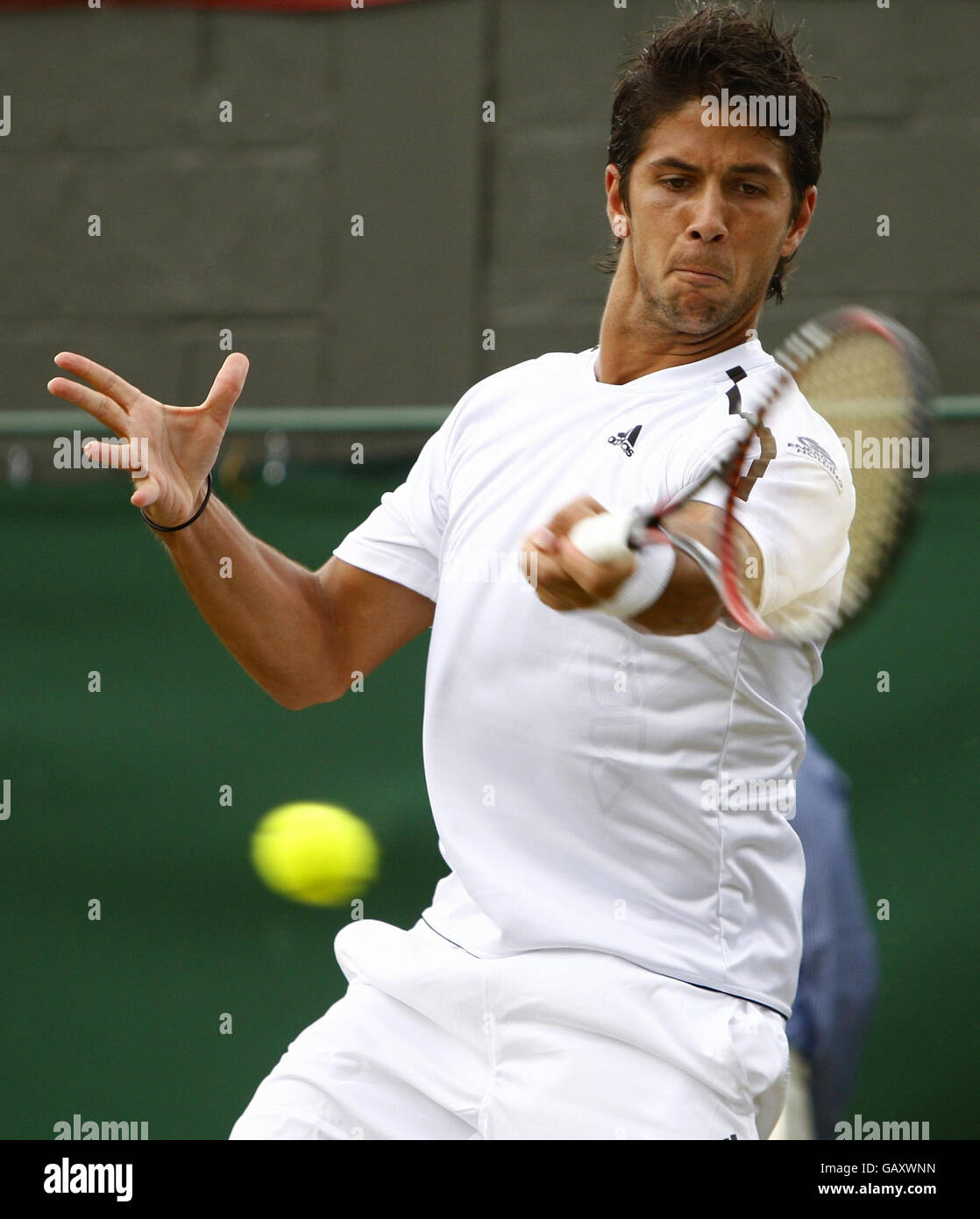 Czech tennis player Tomas Berdych playing service shot in