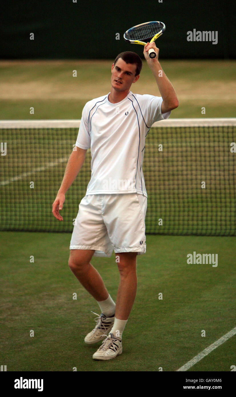 Great Britain's Jamie Murray celebrates victory in his mixed doubles match with USA's Liezel Huber during the Wimbledon Championships 2008 at the All England Tennis Club in Wimbledon. Stock Photo