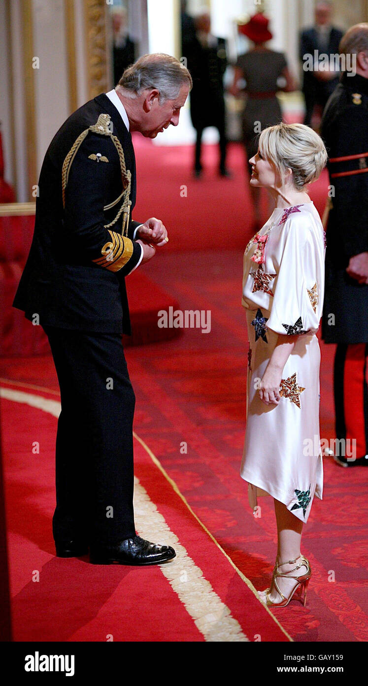 Pop singer Kylie Minogue receives an OBE from the Prince of Wales for services to music, at Buckingham Palace, London. Stock Photo
