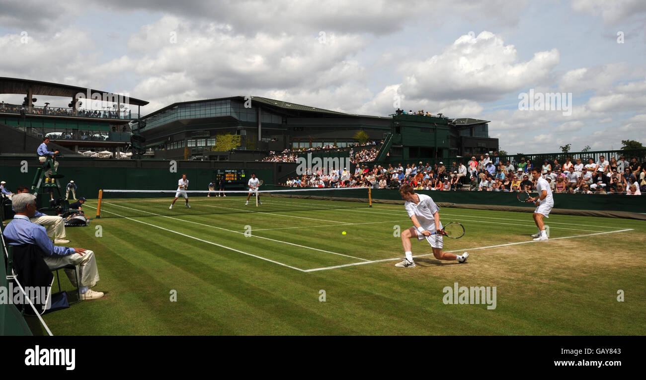 A general view of Great Britain's Alex Bogdanovic and Jonathan Marray in their doubles match during the Wimbledon Championships 2008 at the All England Tennis Club in Wimbledon. Stock Photo