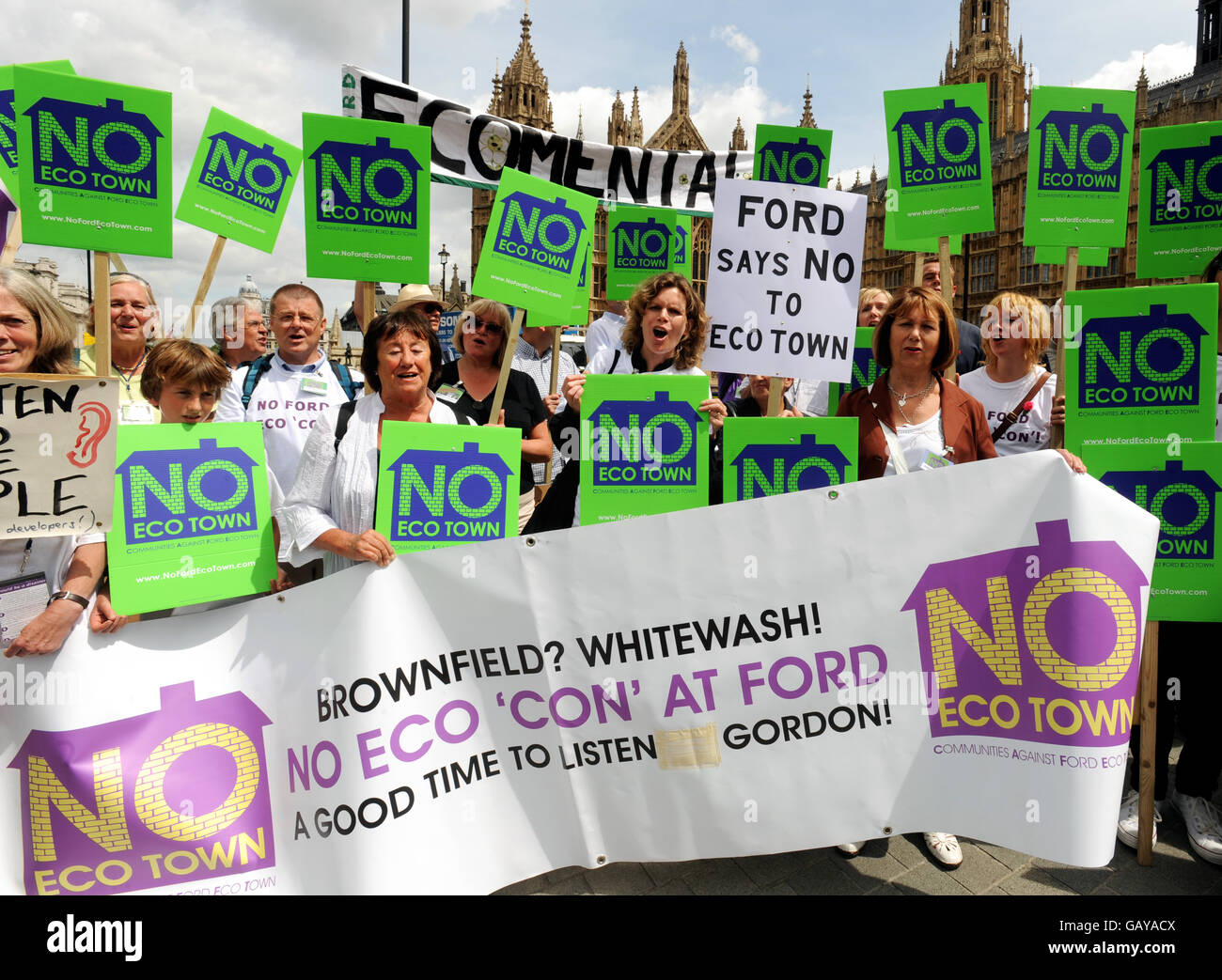 A group of protesters from Ford, Climping, Yapton and Walberton, outside the Houses of Parliament, in London, voice their opposition for plans to build new eco-towns in their county of West Sussex. Stock Photo