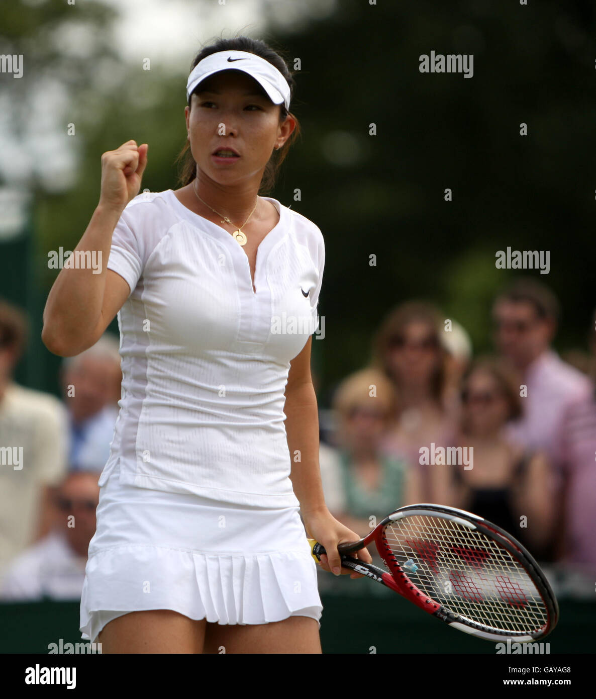 Tennis - Wimbledon Championships 2008 - Day Seven - The All England Club. Zheng Jie celebrates winning a point against Agnes Szavay Stock Photo