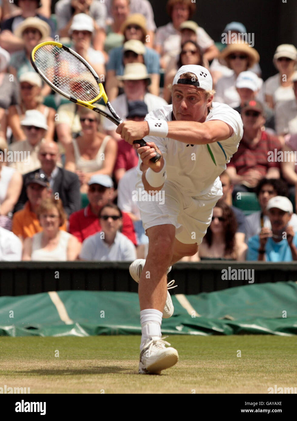 Australia S Lleyton Hewitt In Action Against Switzerland S Roger Federer During The Wimbledon