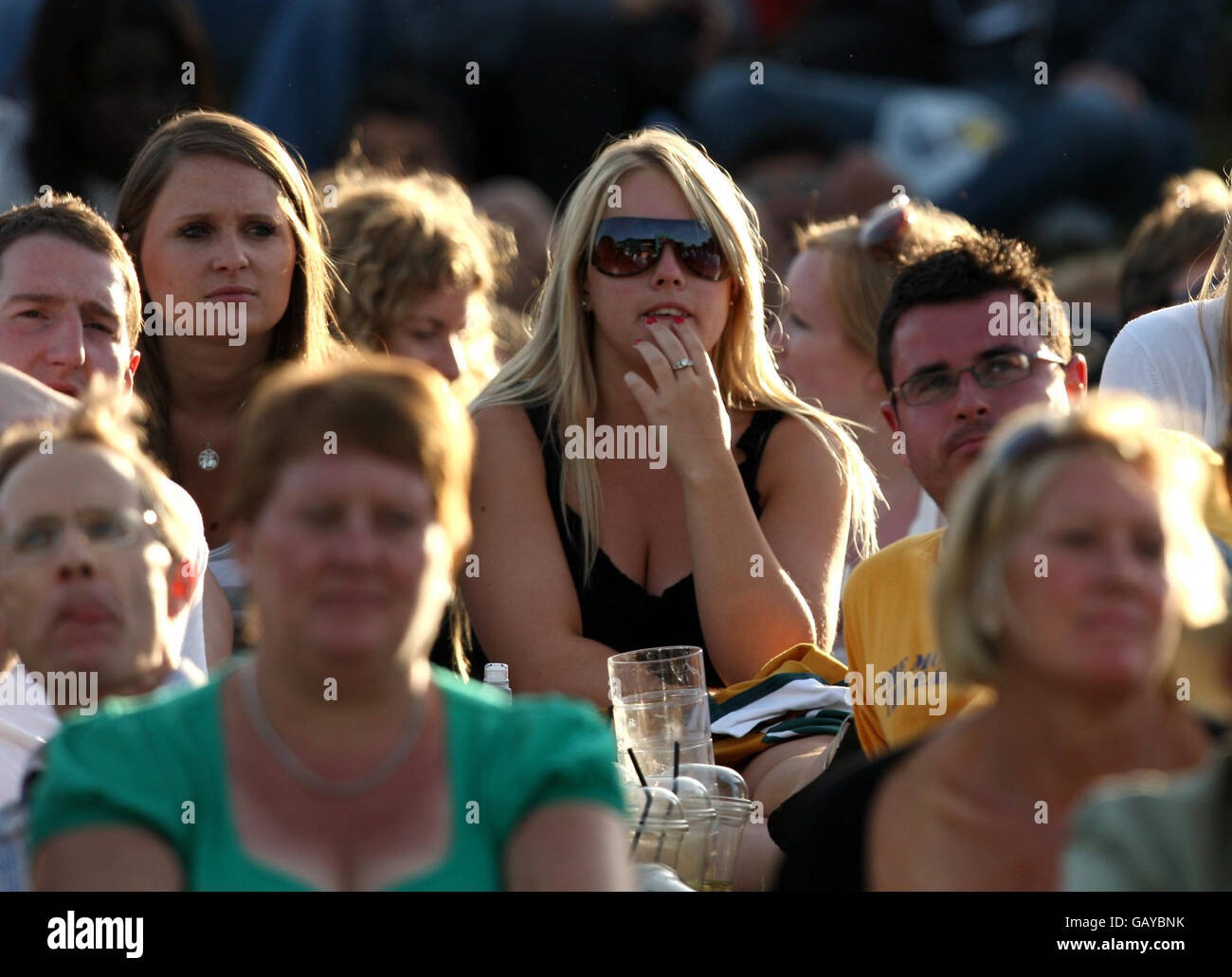 Spectators on Murray Mount watch anxiously as Great Britain's Andy Murray plays against France's Richard Gasquet during the Wimbledon Championships 2008 at the All England Tennis Club in Wimbledon. Stock Photo