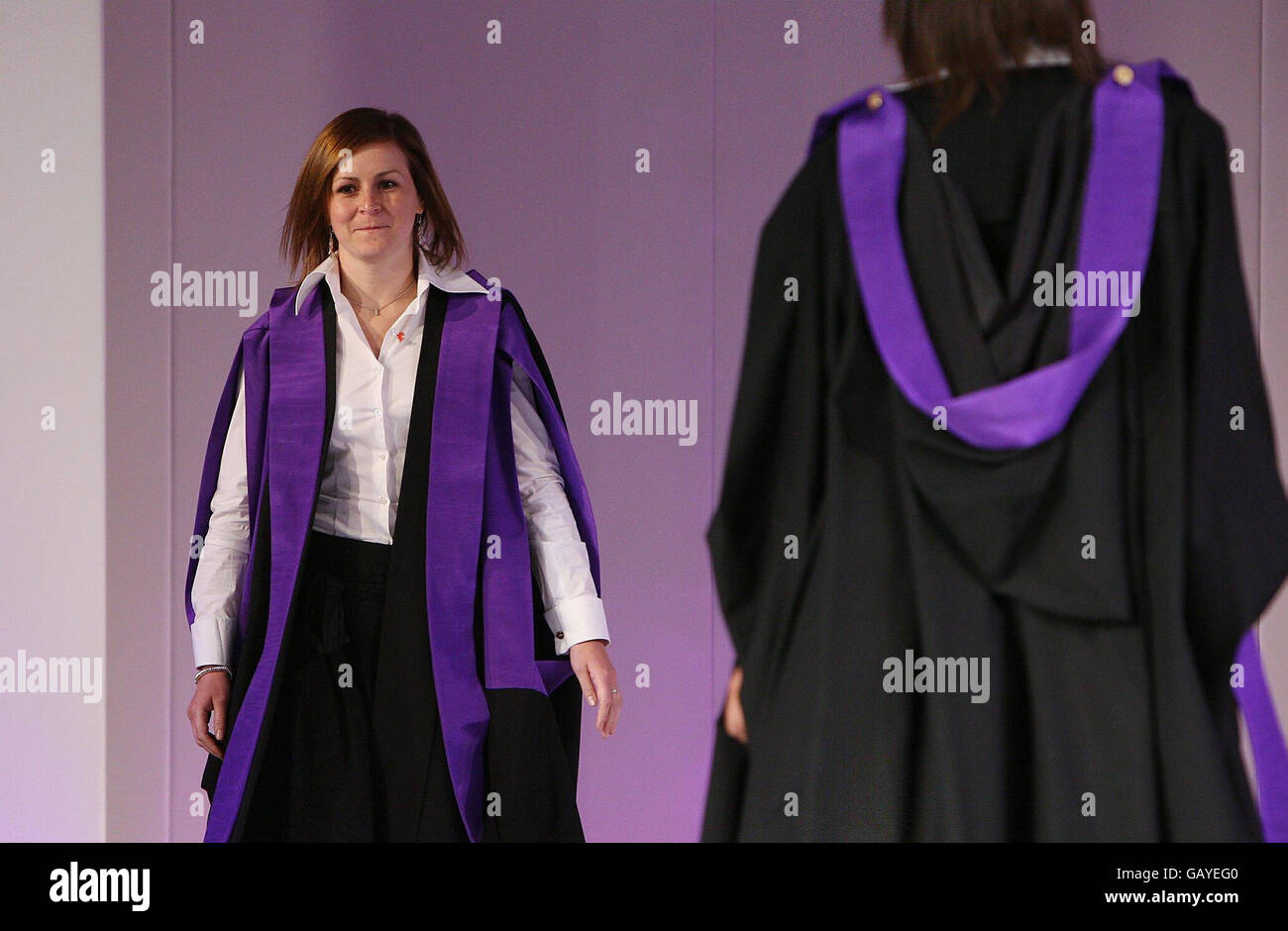 Students unveil the new King s College academic gowns designed by Dame Vivienne Westwood in The Great Hall of Kings College central London Stock Photo Alamy