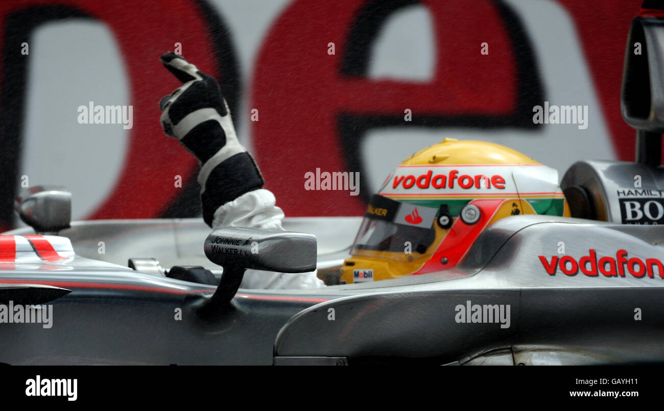 A close up of McLaren's Lewis Hamilton as he celebrates winning the