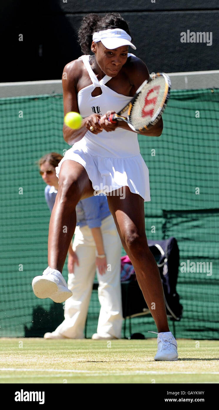 USA's Venus Williams in action against Thailand's Tamarine Tanasugarn during the Wimbledon Championships 2008 at the All England Tennis Club in Wimbledon. Stock Photo