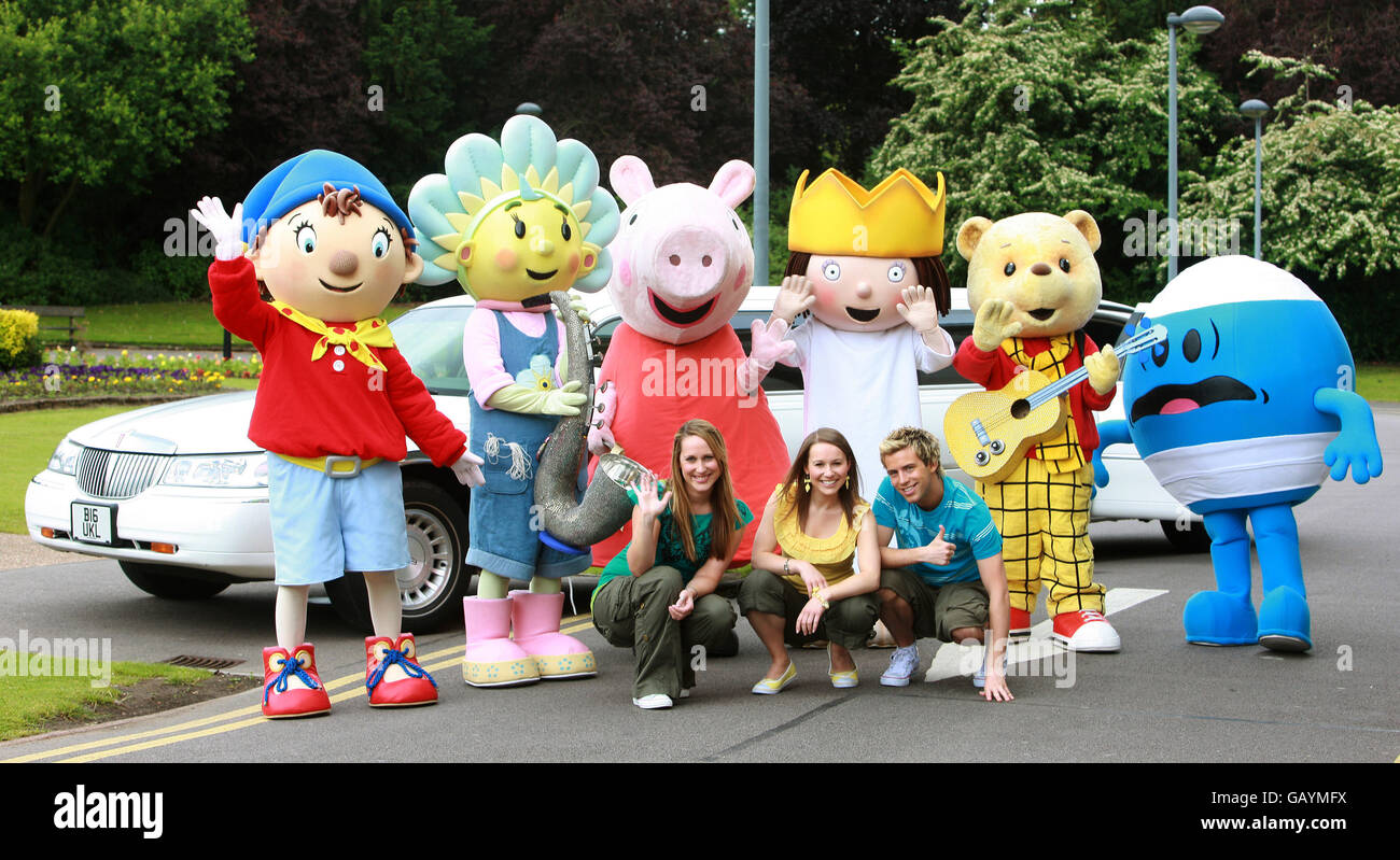 The Milkshake tour at De Montford Hall in Leicester. Characters Little Princess, Noddy, Peppa Pig, Rupert, Fifi and Mr.Bump arrive with presenters (L-R) Beth Evans, Jen Pringle and Derek Moran. Stock Photo