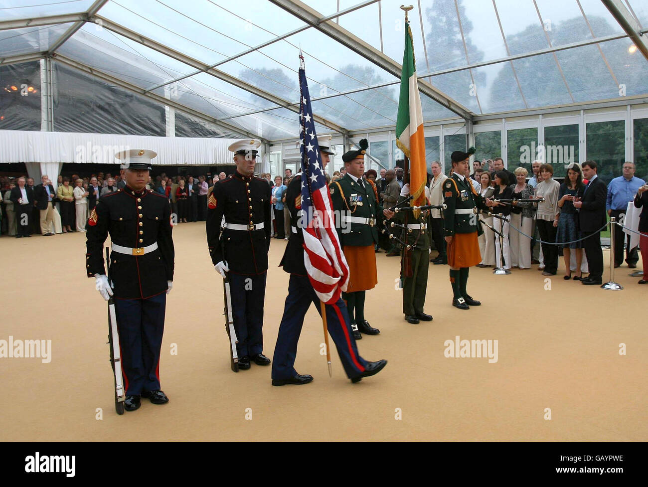Members of the United States Marine Corp and the Irish Defence forces take part in celebrations at the US Ambassador's residence in Phoenix Park, to mark the 4th of July, American Independence Day. Dublin. Stock Photo