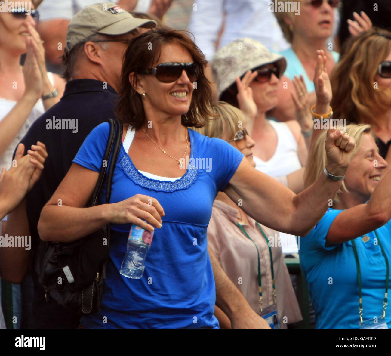 Great Britain's Laura Robsons mother Kathy celebrates her daughters victory against Thailand's Noppawan Lertcheewakarn during the Wimbledon Championships 2008 at the All England Tennis Club in Wimbledon. Stock Photo