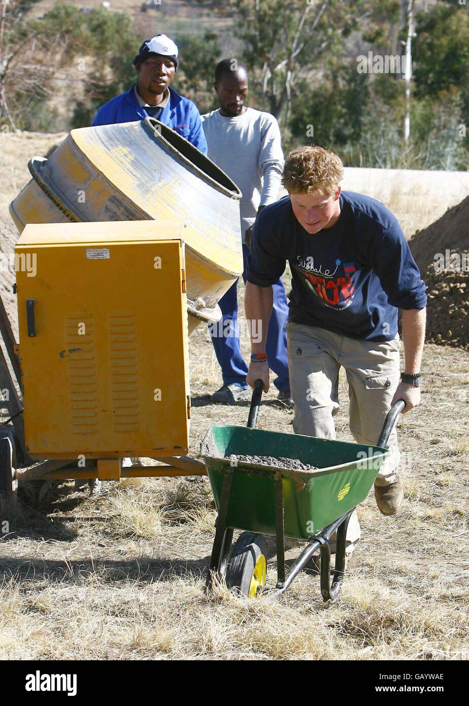 Prince Harry and members of the Household Cavalry Regiment help rebuild