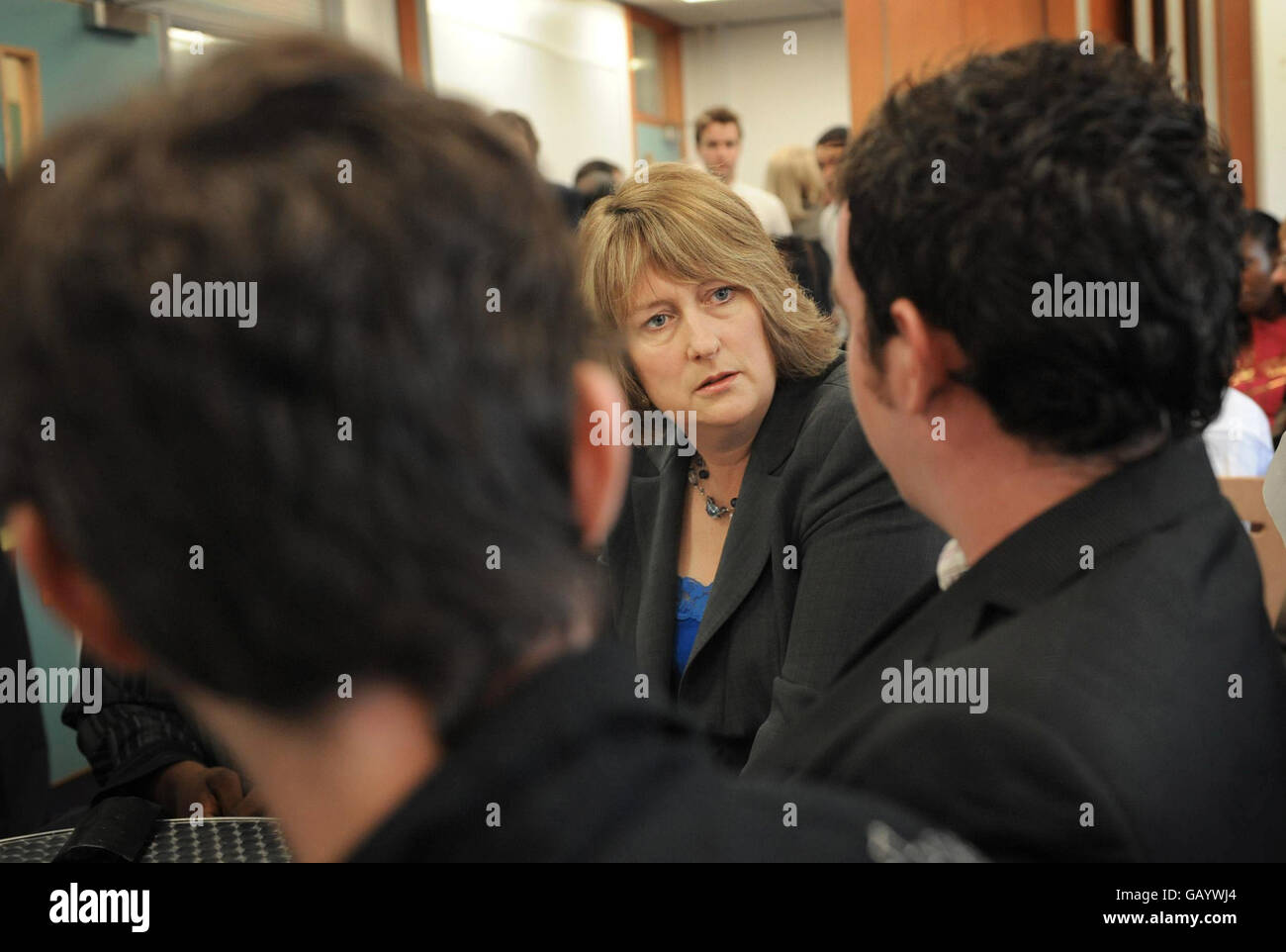 Home Secretary Jacqui Smith chats with students at Shooters Hill College in south east London, about their opinions on the introduction of ID cards. Stock Photo
