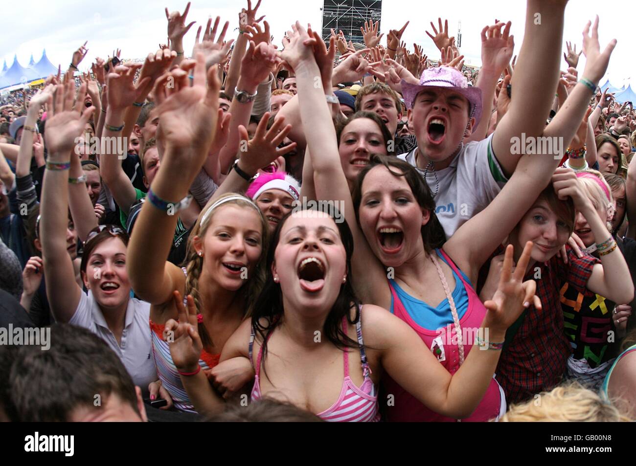 Festival goers watch Scouting For Girls perform during the Oxegen Festival 2008 at the Punchestown Racecourse, Naas, County Kildare, Ireland. Stock Photo