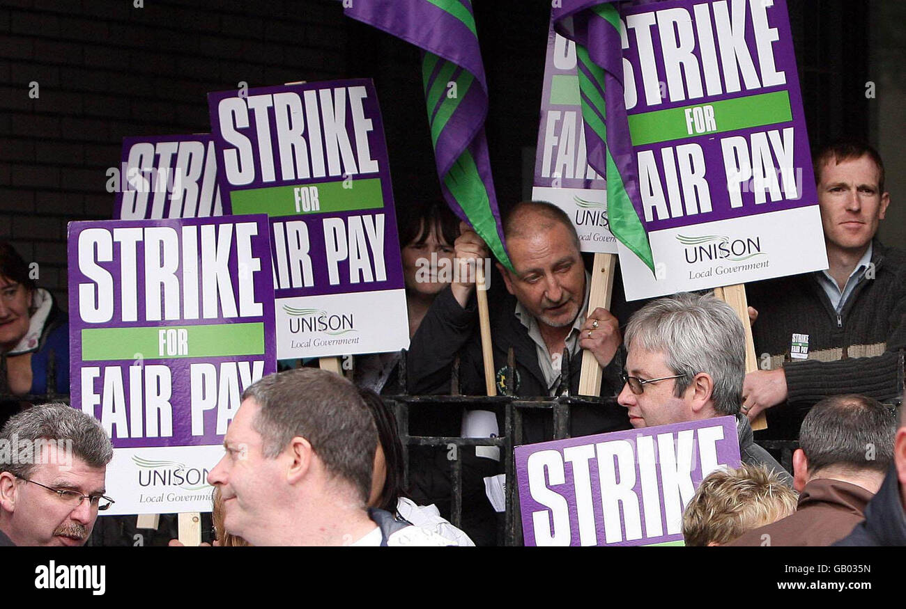 Local government workers outside Transport House, Belfast, striking in a bid for better pay. Stock Photo