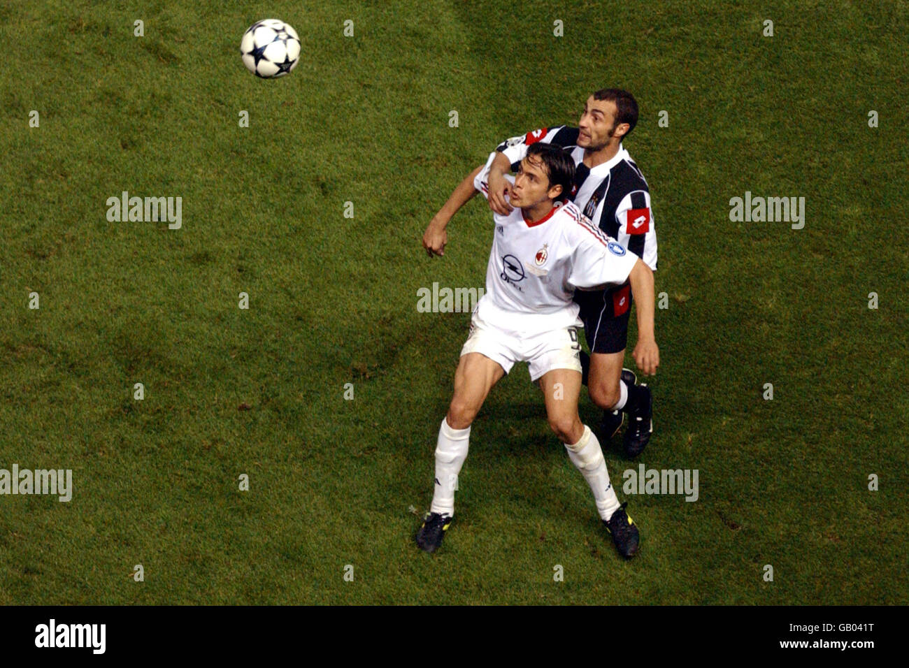Soccer - UEFA Champions League - Final - Juventus v AC Milan. AC Milan's Filippo Inzaghi (l) shields the ball from Juventus' Paolo Montero Stock Photo