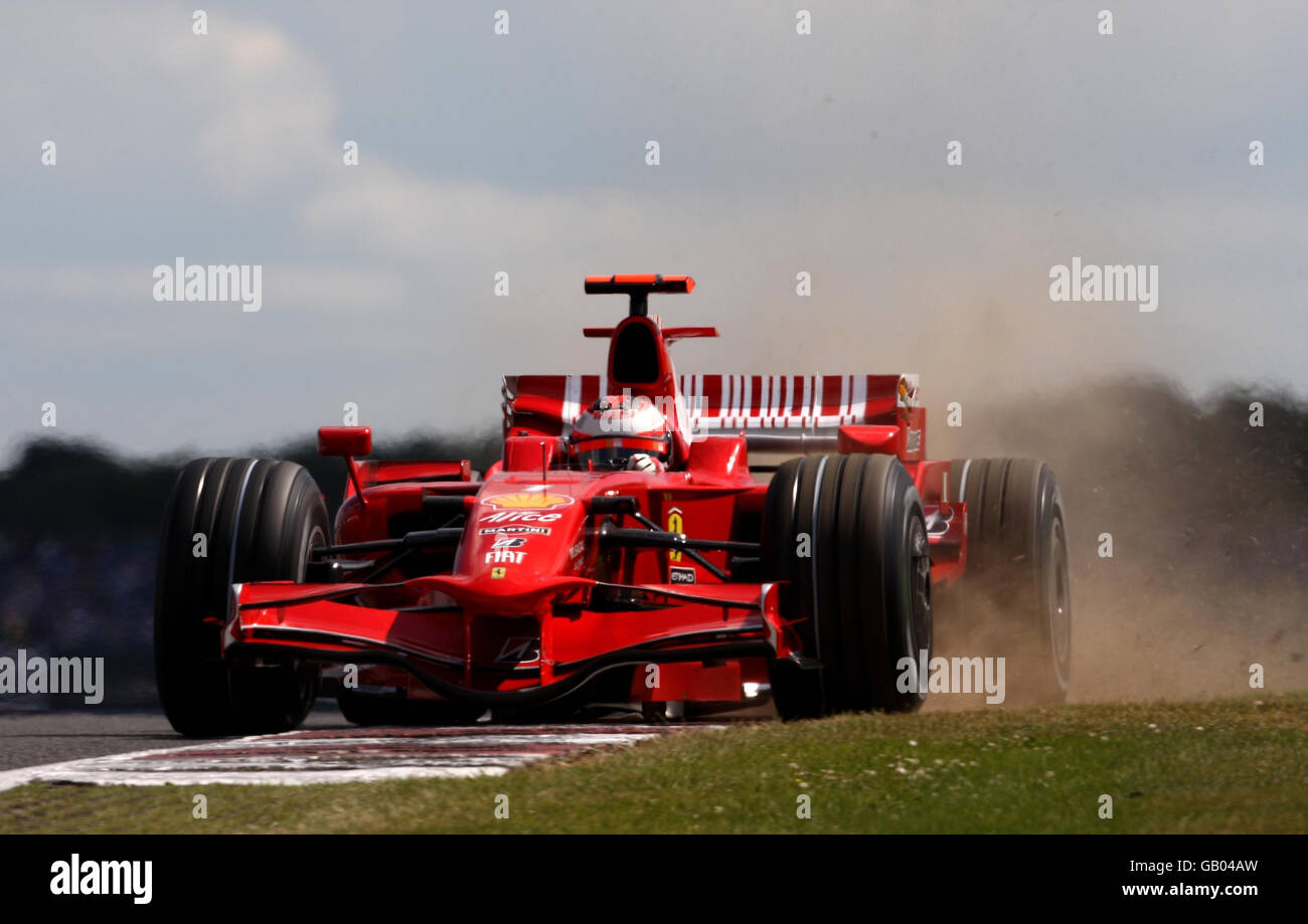 Formula One Motor Racing - British Grand Prix - Practice Day - Silverstone. Ferrari's Kimi Raikkonen gets his car on the dirt during second practice at Silverstone, Northamptonshire. Stock Photo