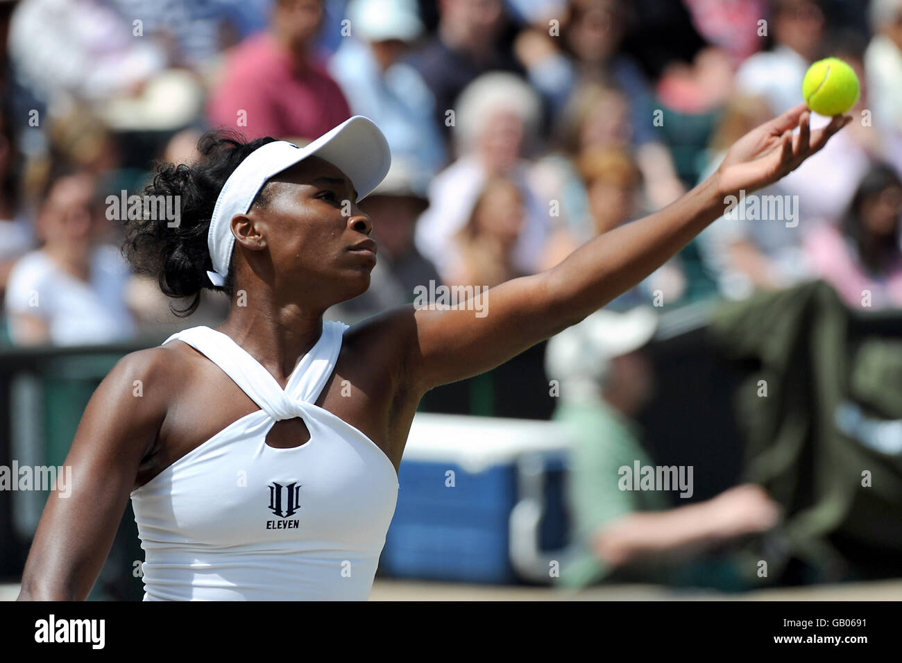 USA's Venus Williams in action against Russia's Elena Dementieva during the Wimbledon Championships 2008 Stock Photo