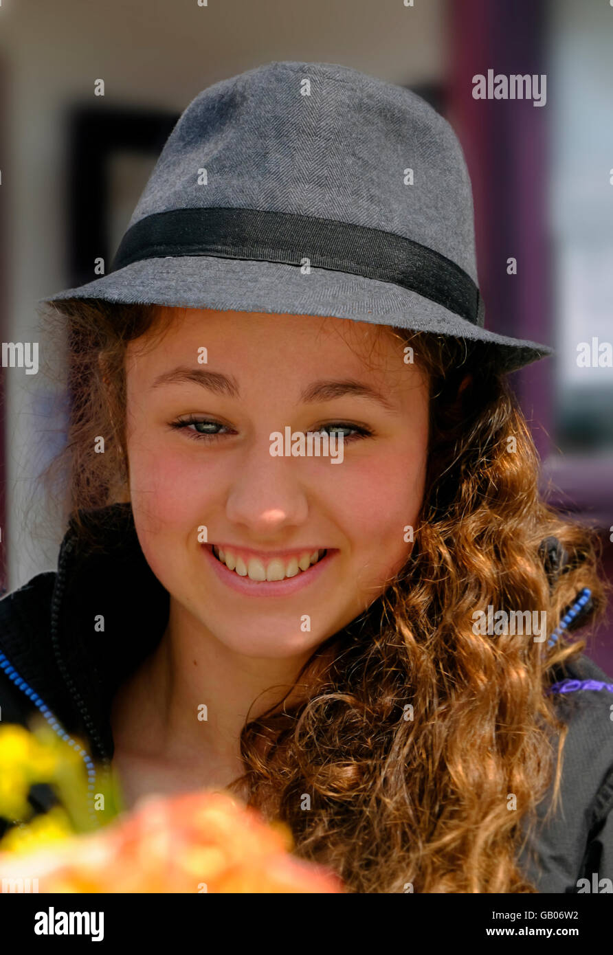 Pretty teenager wearing a grey hat ,Ireland Stock Photo